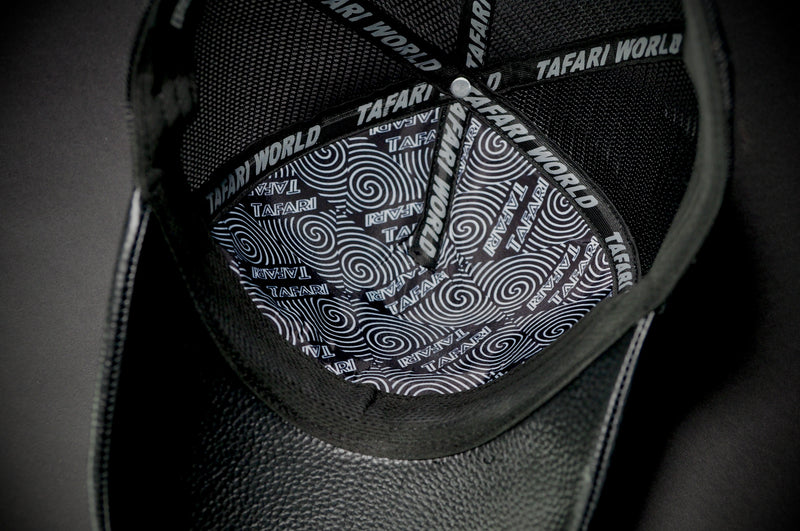 TAJI LEATHER TRUCKER HAT